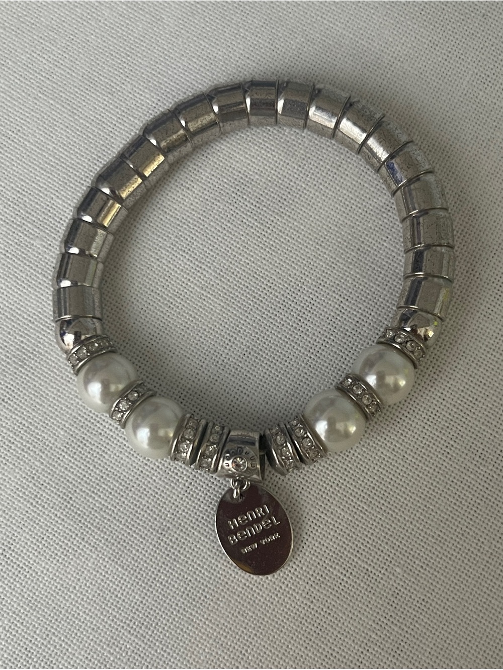 henri bendel Silver and Pearl Stretch Bracelet with Logo Charm